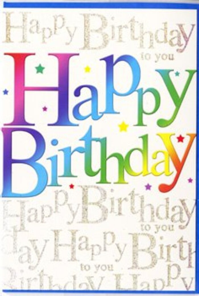 In this image, a striking birthday card stands upright, glowing with the same kind of colour and warmth you might find in a well-loved corner of Dulwich on a bright afternoon. Across the centre, the words Happy Birthday appear in large, generous letters, each one filled with a flowing gradient of colour that sweeps from one shade to the next. Starting in lush cherry reds and rosy pinks, the hues glide into rich orange, golden yellow, and soft lime, before leaning into cool jade, sky blue, and deep indigo, finally resting in plums and violets. The rainbow effect feels smooth and deliberate, like the careful blending of tones in a florist's hand-tied bouquet. The letters themselves are full and slightly rounded, conveying friendliness and delight, as though they are gently lifting off the page in celebration. Behind this vivid message lies a background of repeated gold script, writing out Happy Birthday to you in slender, looping cursive from edge to edge. The metallic ink introduces a gentle shimmer, not overpowering but clearly present, like dappled sunlight filtering through trees along College Road. Fine specks and small decorative marks scattered around the text suggest confetti or tiny stars, adding an airy lightness, as if the design is mid-celebration. The card's surface appears smooth with a hint of gloss, enhancing the richness of the colours. Overall, the image conveys an atmosphere of genuine joy and affection-the sort of card you might pair with a colourful floral arrangement delivered across Dulwich and Herne Hill to make a birthday feel extra special, vividly remembered, and truly cherished.